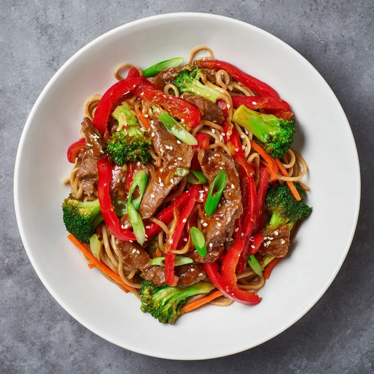 Easy Beef Stir-Fry with Lo Mein Noodles, a steaming bowl of savory goodness ready to enjoy.