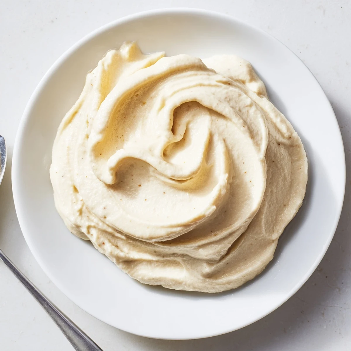 Perfectly blended 2-Ingredient Banana Ice Cream offers a sweet, healthy, and easy treat option.