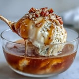 Hojicha Affogato with creamy vanilla ice cream, drenched in a steaming shot of roasted Japanese green tea.