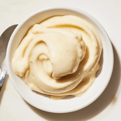 Creamy 2-Ingredient Banana Ice Cream, a cool dessert made with frozen bananas, ready to eat.