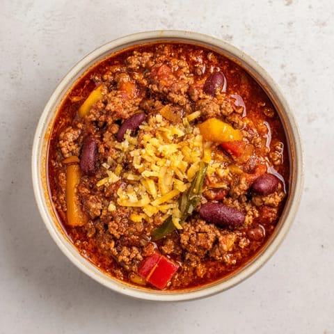Hearty Simple Weeknight Chili with ground beef and beans, perfect for a cozy weeknight dinner.