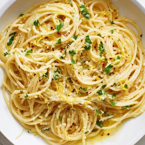 Fragrant garlic butter coats every strand of these delicious Garlic Butter Noodles, a quick and easy weekday meal.