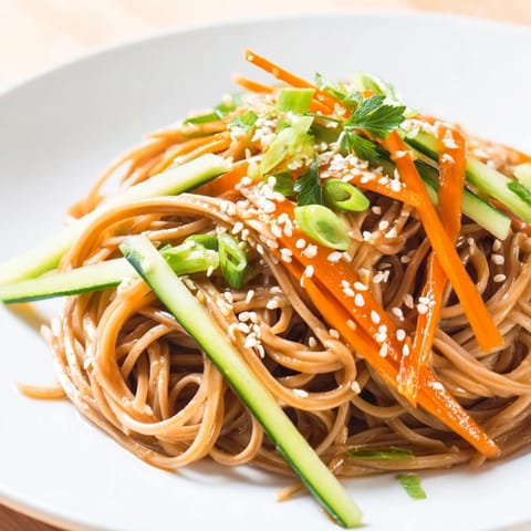 Cool, refreshing Chilled Noodle Lunch Cups, featuring tender noodles and crunchy cucumber and carrots.