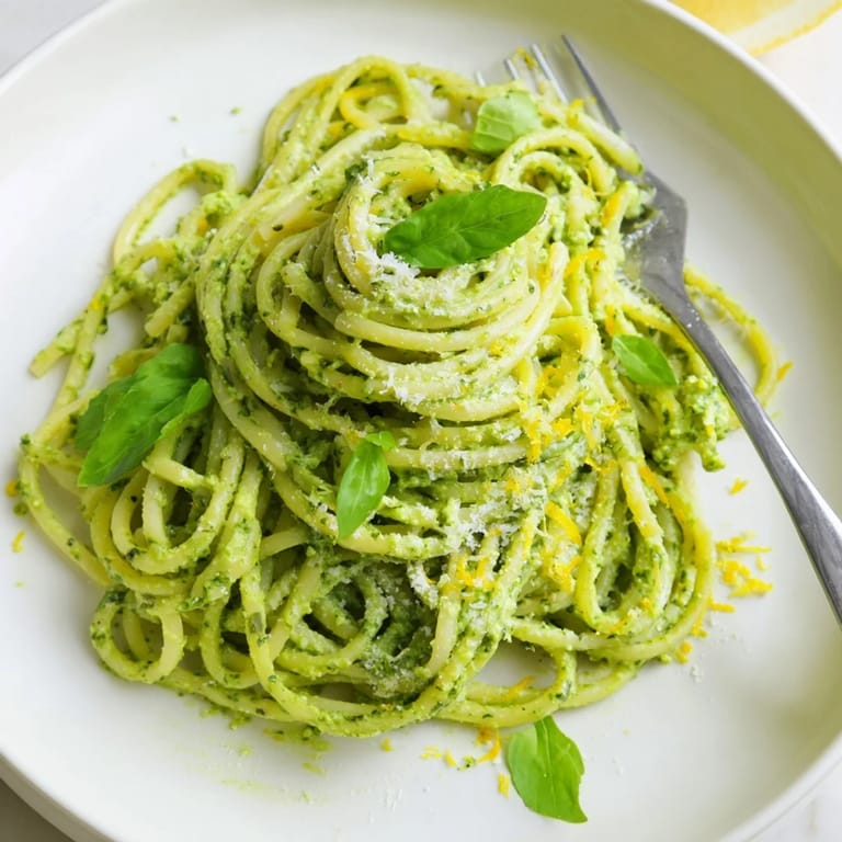 Delicious Creamy Avocado Pasta, blended with fresh basil and lemon, perfect for a quick dinner.