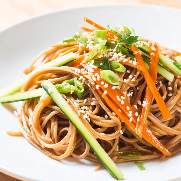 Cool, refreshing Chilled Noodle Lunch Cups, featuring tender noodles and crunchy cucumber and carrots.