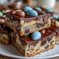 Soft, chewy peanut butter Easter egg cookie bars with colorful candy eggs baked to golden perfection.